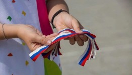 Акция «Российский триколор — звучит гордо!»